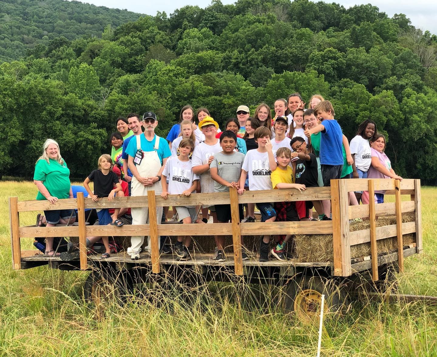 Group of campers on a hay wagon ride