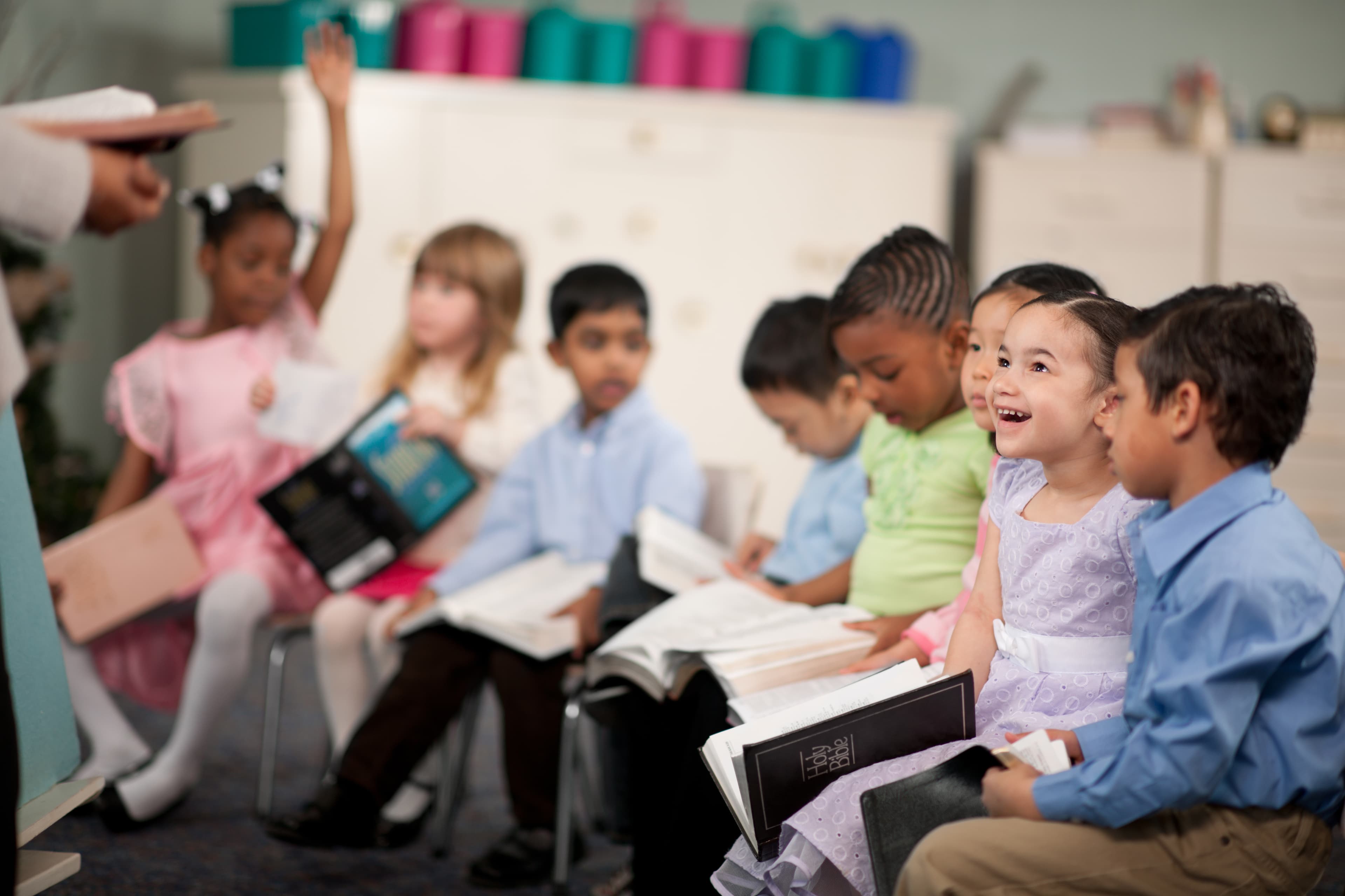 Children reading the Holy Bible together