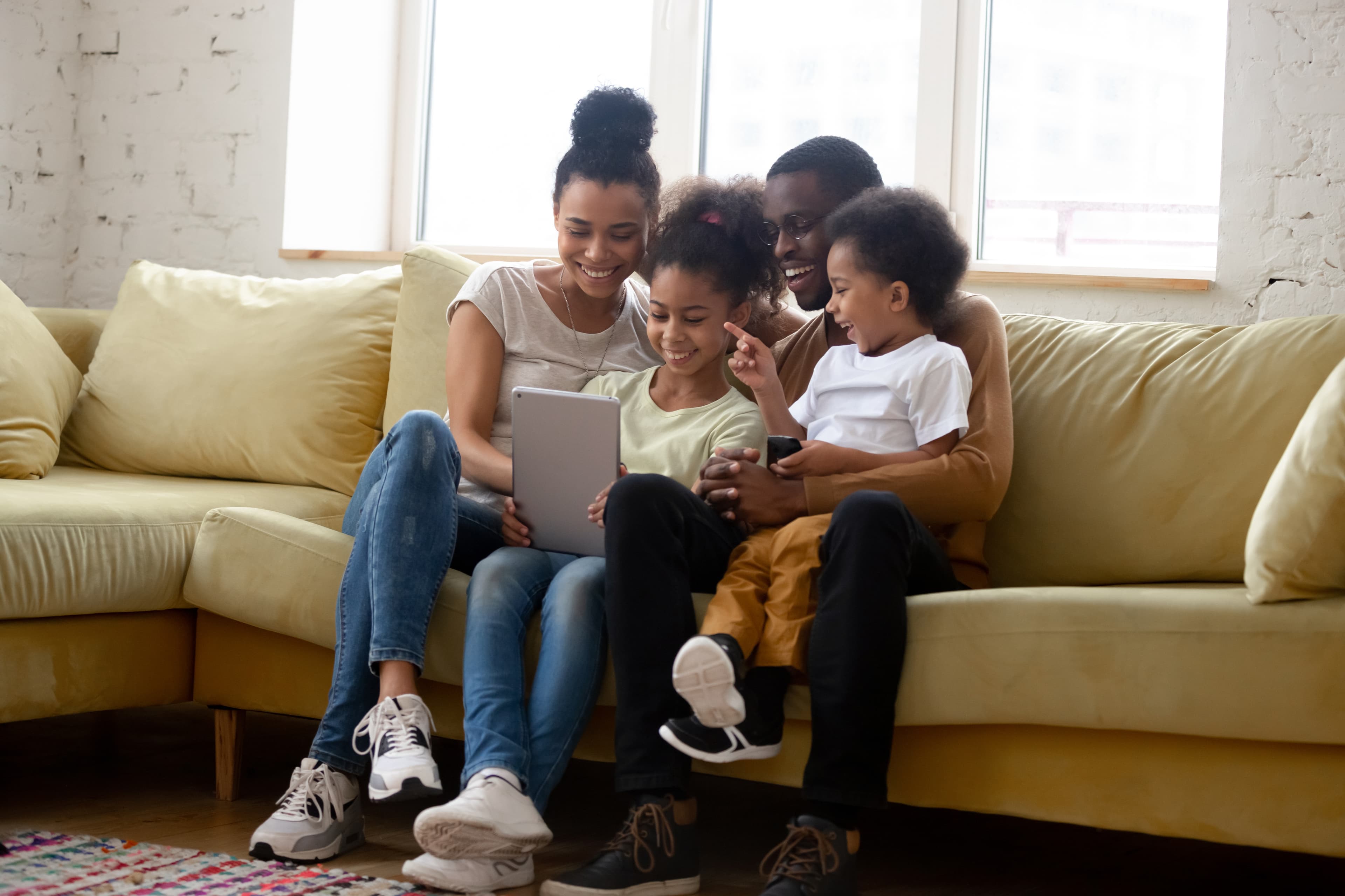 Parent reading the Bible with a child at home
