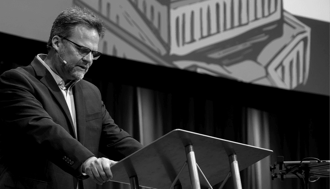 Jeff Keaton speaking on stage at a RenewaNation event