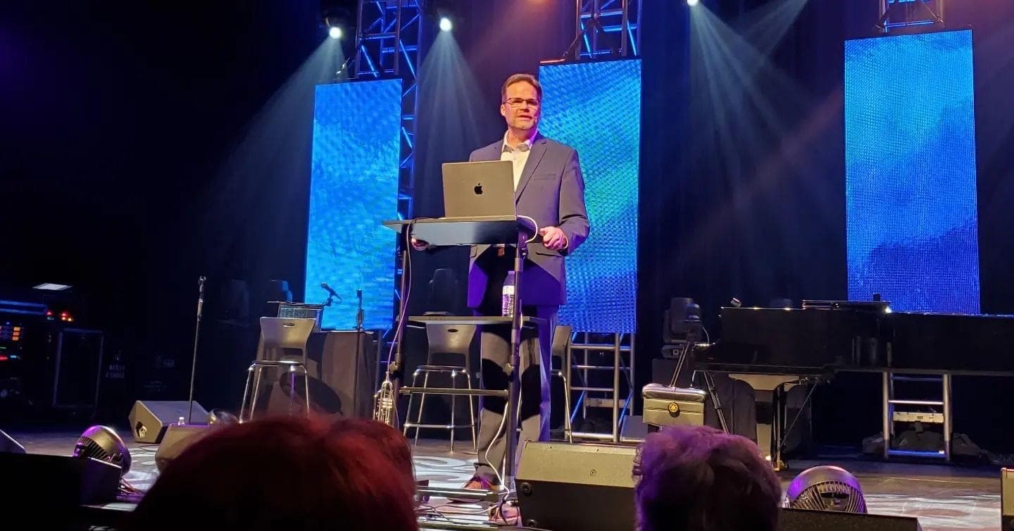 A RenewaNation speaker addressing a congregation
